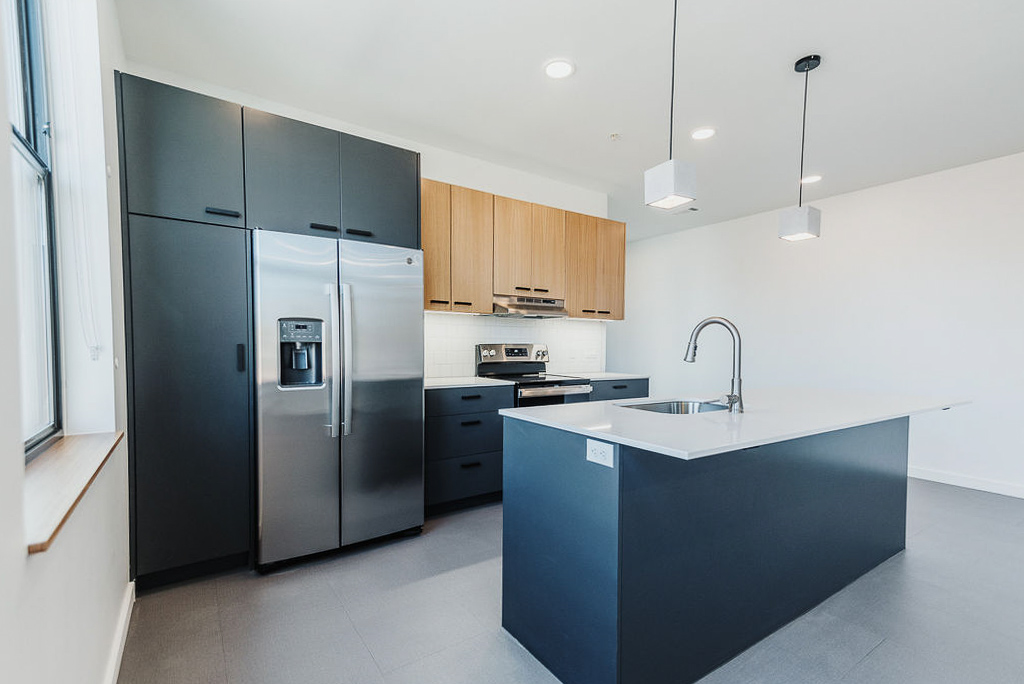 stainless steel appliances in modern kitchen town branch apartments